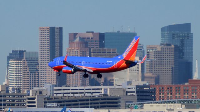 BOEING 737-300 (N376SW) - Planes taking off and landing on Runway 22L at Boston/Logan Airport.  Shots taken from  Simon J. Donovan Beach in Winthrop.