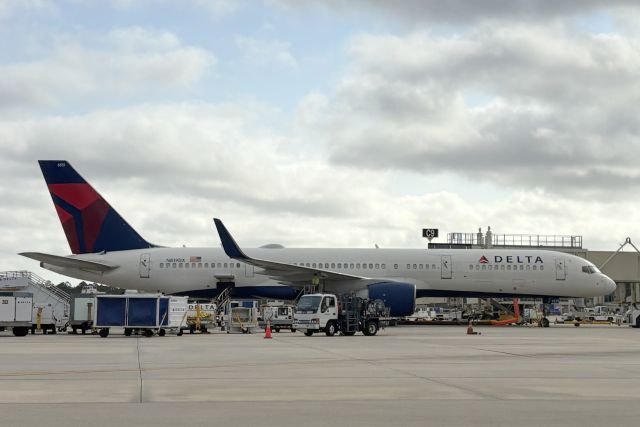 Boeing 757-200 (N819DX) - Delta Flight 1089 sits at Gate C9 at Southwest Florida International Airport preparing for flight to Hartsfield-Jackson Atlanta International Airport (12/11/24)