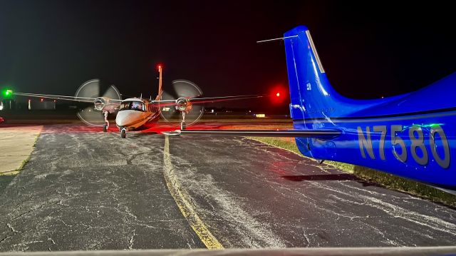 Gulfstream Aerospace Jetprop Commander (N695HT) - N695HT posing w/ N7580 after a late arrival from KBUU. 6/16/22. 