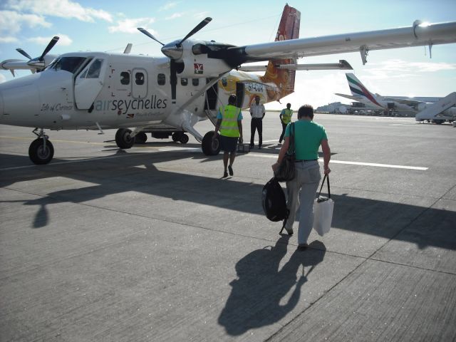 S7-CUR — - Boarding Air Seychelles Mahe - Praslin flight November 14th 2011.