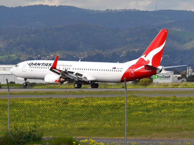 Boeing 737-800 (VH-VXA) - Putting down on runway 05. Thursday 12th July 2012.