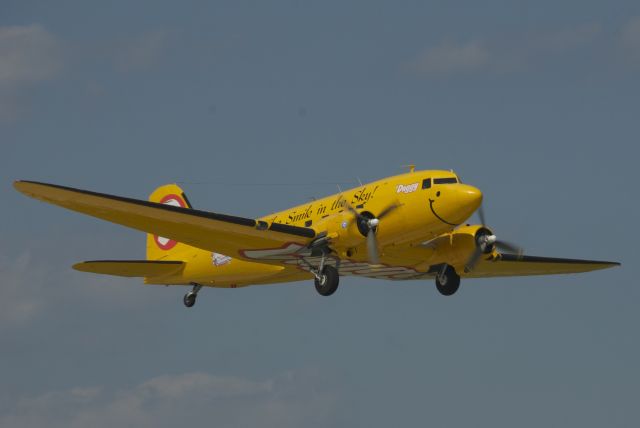 Douglas DC-3 (N1XP) - Returning back to ground after dropping off the Liberty Parachute team during AirVenture 2010, Oshkosh, WI