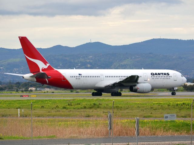 BOEING 767-300 (VH-ZXC) - On taxi-way heading for take off on runway 05, for flight to Sydney. Thursday 12th July 2012.
