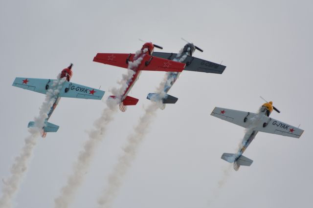 YAKOVLEV Yak-50 (MULTIPLE) - The Aerostars aerobatic team performing at Duxford Air Show on 19 September 2015