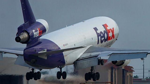 McDonnell Douglas DC-10 (N304FE) - Going around after briefly on runway 22.