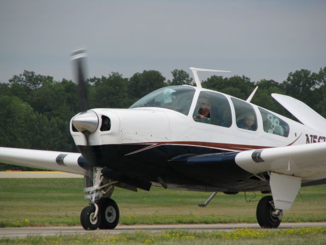 Beechcraft 35 Bonanza (N56VT) - Excited to arrive at Oshkosh.