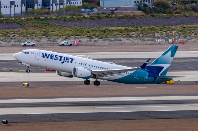 Boeing 737 MAX 8 (C-GLWS) - A WestJet 737 MAX 8 taking off from PHX on 2/13/23, the busiest day in PHX history, during the Super Bowl rush. Taken with a Canon R7 and Canon EF 100-400 II L lens.