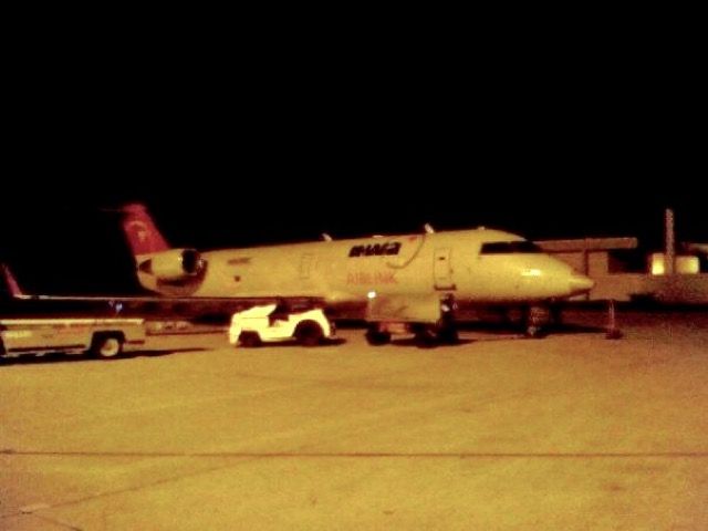 Canadair Regional Jet CRJ-200 — - One of the last nights before the station was taken over by Delta.  Taken May 2009.