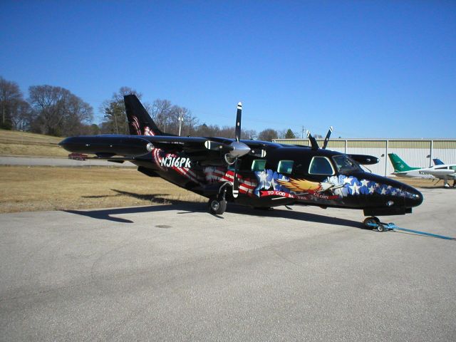 Mitsubishi MU-2 (N316PR) - Taken 01/13/2003 at JetSouth, now, Atlantic West.