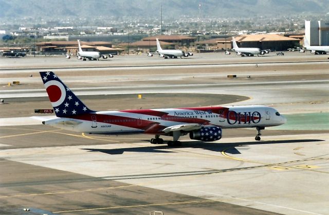 Boeing 757-200 (N905AW) - KPHX- City of Columbus taxis to the main departure runway