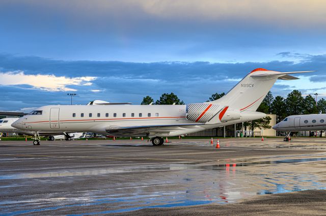 Bombardier Global 5000 (N89CV) - N89CV sitting on the ramp after an evening rain storm