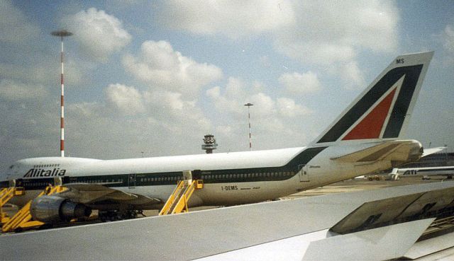 Boeing 747-200 (I-DEMS) - Alitalia - B747-243B (I-DEMS) Photo taken after landing at FCO airport on board a Garuda B747 en route SIN - AUH - DXB - FCO - AMS flight. (Scan from photo Sep 1988)