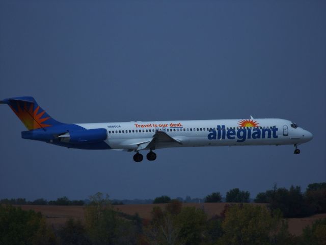 McDonnell Douglas MD-80 (N880GA) - On short final. Landing runway 5 in Des Moines Iowa. Beautiful landscape in the background