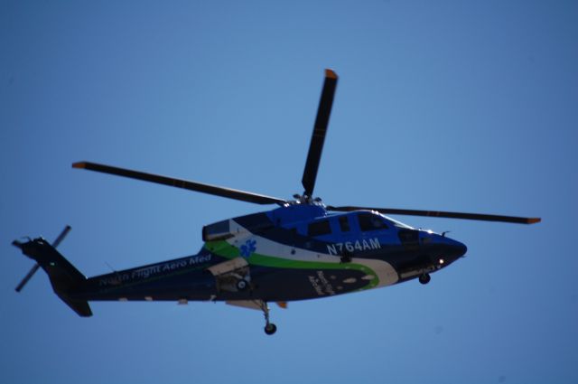 Sikorsky S-76 (N764AM) - North FLight AeroMed landing at KTVC with a critical patient. The patient was taken by ambulance to the nearby Munson Medical Center