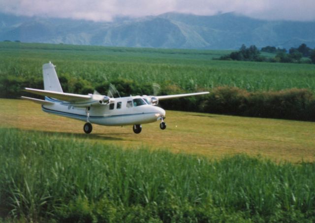 Aero Commander 500 (CHQ48) - Landing at Nasuli in the southern Philippines