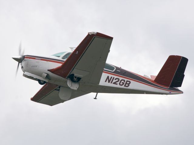 Beechcraft Bonanza (36) (N12GB) - Take off runway 26.