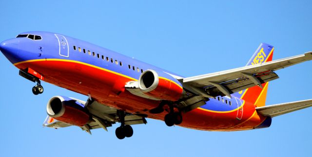 Boeing 737-700 (N394SW) - Landing 30L, 07-16-2013