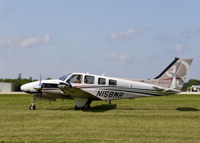 Beechcraft Baron (58) (N158MR) - On flightline.