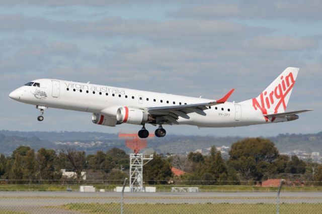 Embraer ERJ-190 (VH-VPT) - About to put down on runway 05. Thursday 7th August 2014