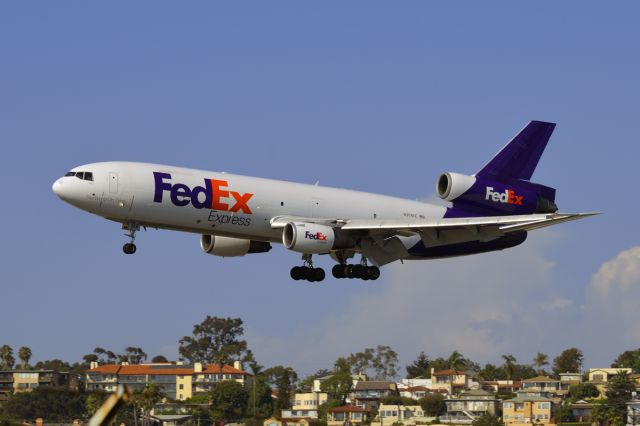 Canadair Challenger (N304FE) - Taken from corner of Laurel & Harbor Drive @ San Diego CA