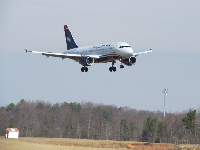 Airbus A319 (N767UW) - A US Airways A319 landing at KCLT (Charlotte, NC).