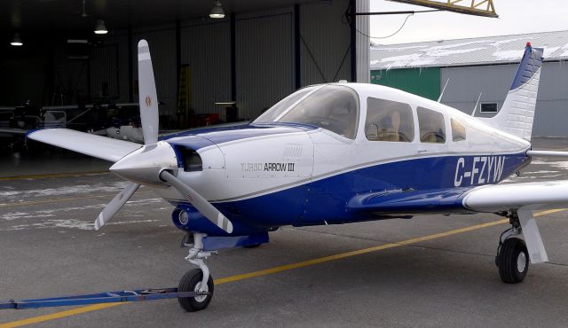 Piper Cherokee Arrow (C-FZYW) - Back home at CYHU.