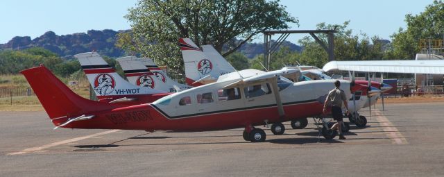 Cessna T207 Turbo Stationair 8 (VH-WOY) - C207 WOY about to become a tail dragger if the passengers wriggle just a little. Yup critical weight and balance done. Photographed back on a very sunny warm day in May 2008.