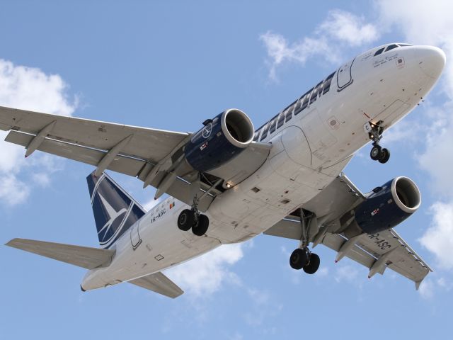 Airbus A318 (YR-ASC) - Belly shot of Tarom A318, approaching LHR runway 027R.