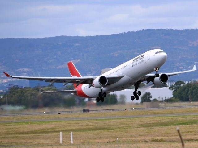 Airbus A330-300 (VH-QPD) - Getting airborne off runway 23 and heading for Singapore. Tuesday 27th December 2011.