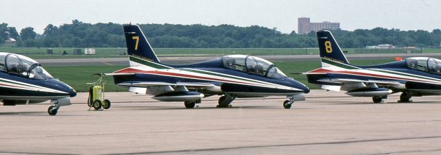 AERMACCHI MB-339 — - McGUIRE AIR FORCE BASE, WRIGHTSTOWN, NEW JERSEY, USA-AUGUST 1986: Performing at the August 1986 Open House and Air Show was the Italian Air Force Aerobatic Team "Frecce Tricolori" (Three-Colored Arrows). 