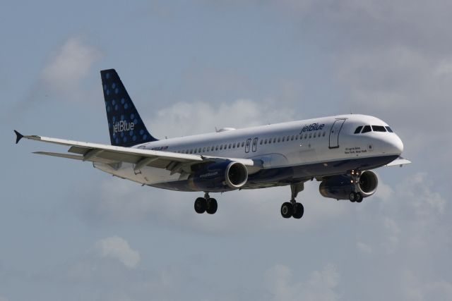 Airbus A320 (N703JB) - JetBlue Flight 341 (N703JB) "It's Up To Blue, New York, New York" arrives on Runway 14 at Sarasota-Bradenton International Airport following a flight from John F Kennedy International Airport