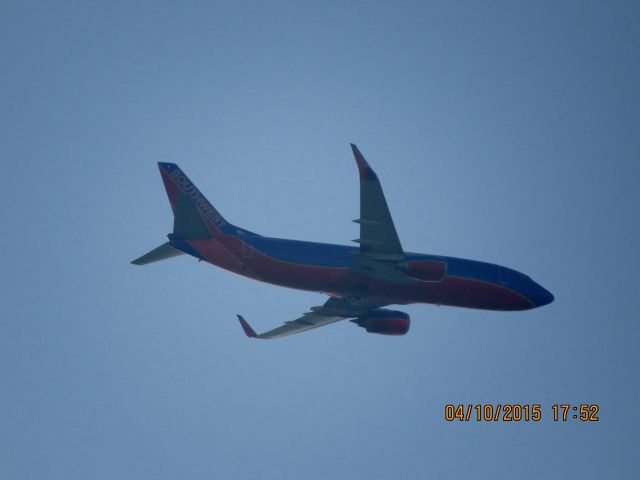 BOEING 737-300 (N365SW) - Southwest flight 40 from Dallas Love to Tulsa over OneOK field in Tulsa.