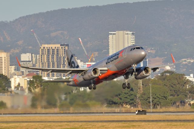 Airbus A320 (VH-VFO) - Late afternoon departure, runway 23