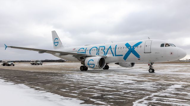 Airbus A320 (N282GX) - An Airbus A320-214 for GlobalX sits on the ramp at Signature Aviation.