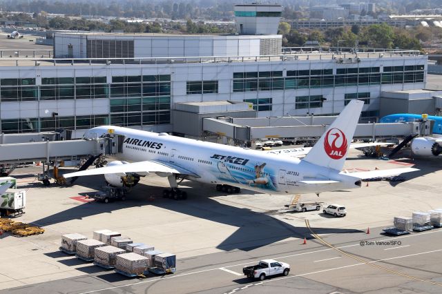 BOEING 777-300ER (JA733J) - KSFO San Francisco,CA USA Below the "Ahoy" tower, note the ramp area behind this jet getting cleared out for push back soon. Special Paint 777-300 since 2016 highlighting Japan tennis star-  Kei Nishikori - this jet is CN 32432 LN 521 and delivered new in June 2005. 