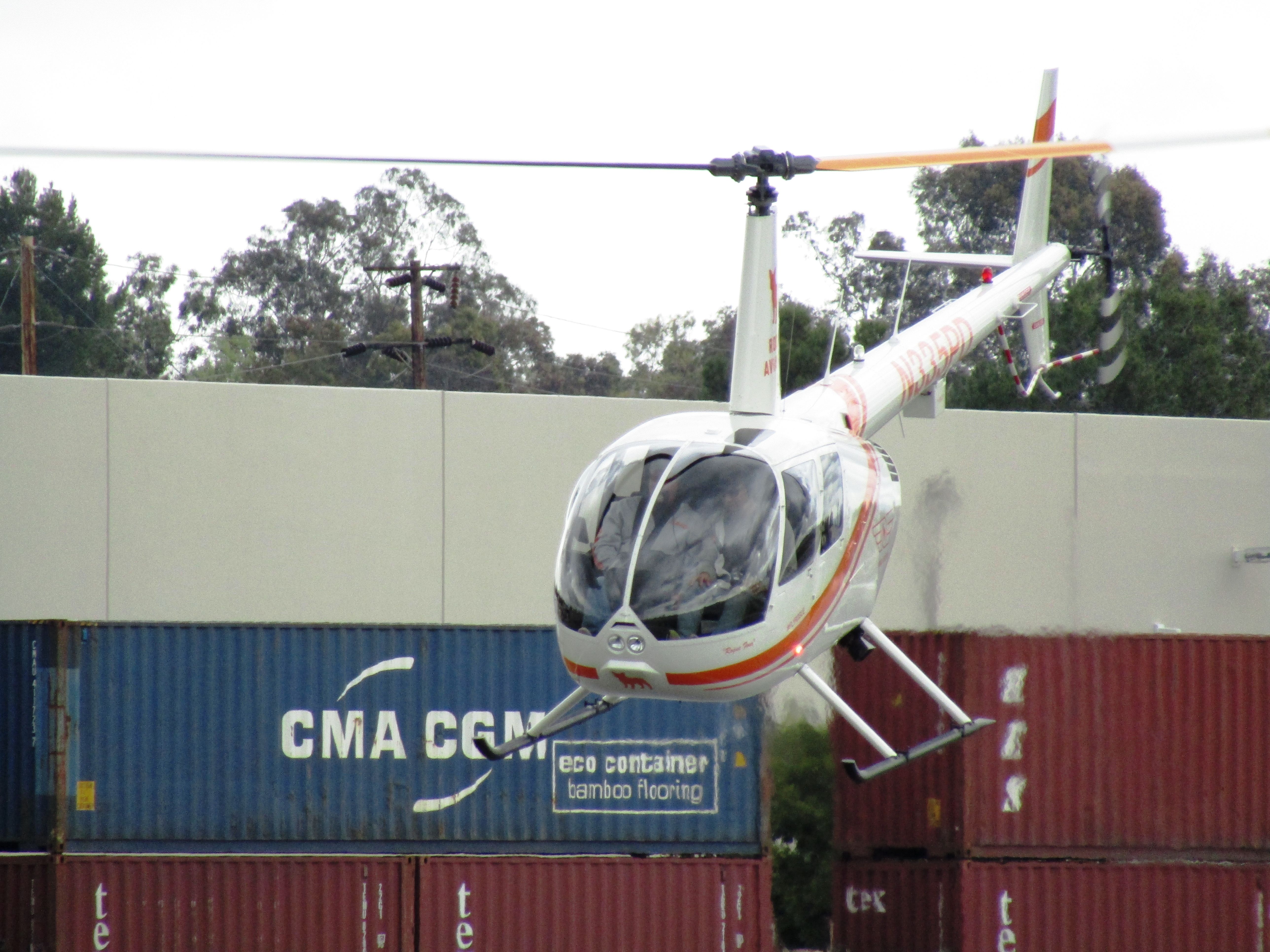Robinson R-44 (N335PD) - Lifting off from RWY 24