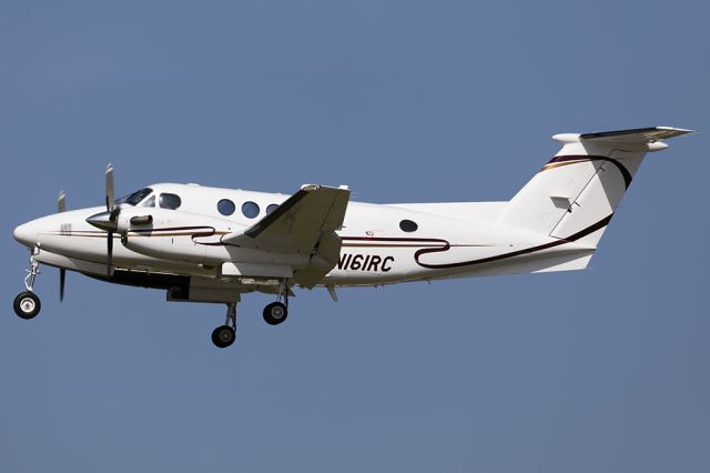 Beechcraft Super King Air 200 (N161RC) - Performing a low flyby on RWY15 to have tower and emergency personal ensure the gear are down. 
