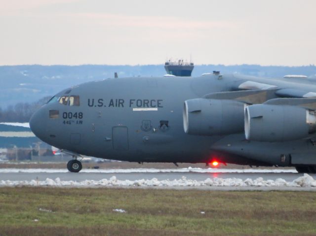 Boeing Globemaster III (97-0048) - RHINO60 holding short of RWY15 waiting for a Dassault Falcon 2000 to land. (11/19/20) 