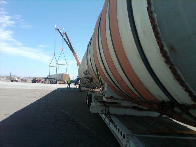 — — - Solid Rocket Boosters from the STS (Space Shuttle) being off-loaded at NASA Dryden Flight Reseach Center. THey will eventually be on dispaly at the California Science Center museum in Los Angeles as part of the Endeavour display