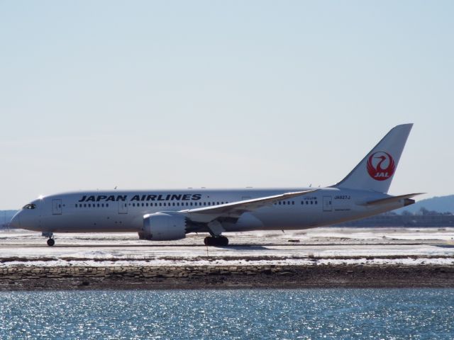 Boeing 787-8 (JA827J) - Boeing 787 holding short runway 22L. Ready to depart a sunny day with a clear