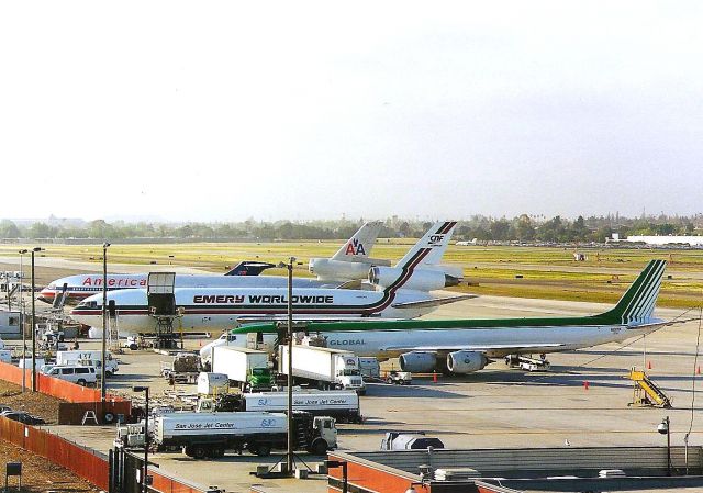 — — - San Jose, CA early 1990s cargo ramp shot from Terminal A parking garage, This view now gone due to SJC airport terminal expansion,,,in fact the whole airport is ruined as a photo spot except for 1 small area.