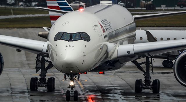 Airbus A350-900 (N503DN) - Pulling into the parking spot to switch crews and start another training leg.