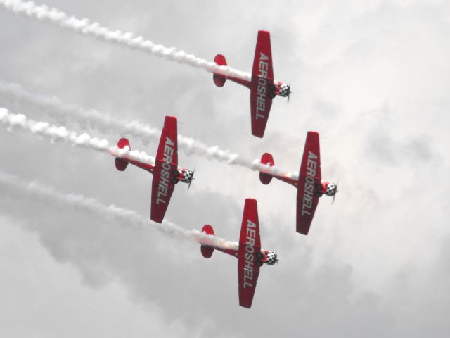 North American T-6 Texan — - Aeroshell T-6s showing how its done at Sun N Fun 2015!