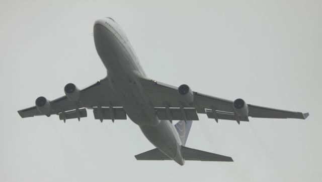 Boeing 747-200 (N118UA) - Fog Shrouded departure over San Bruno, Ca to PEK, 04-28-2015