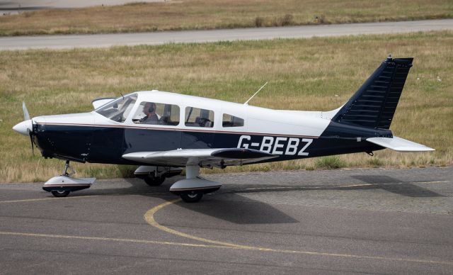 Piper Cherokee (G-BEBZ) - Taxi out from Jersey Aero Club for a training sortie