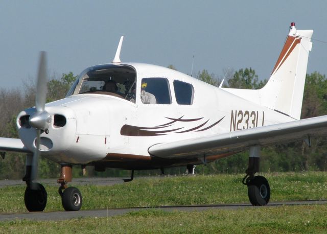 Beechcraft Sundowner (N2331J) - Taxiing to runway 14 on taxiway Foxtrot at the Shreveport Downtown airport.