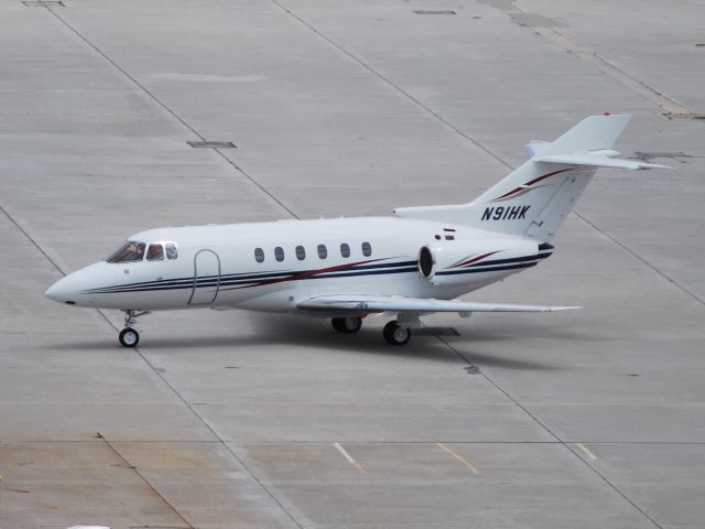 Hawker 800 (N91HK) - MUELLER EAST INC Taxiing in to Landmark Aviation - 6/16/12