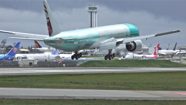 BOEING 777-300 (A7-BEA) - BOE892 on final to runway 16R to complete its maiden flight on 4/13/13. (LN:1098 cn 41779).