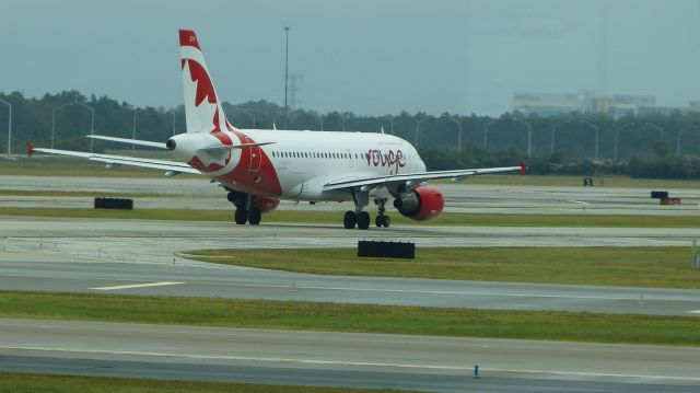 Airbus A319 (C-GBHY) - Taxing on the main taxiway for departure to Toronto