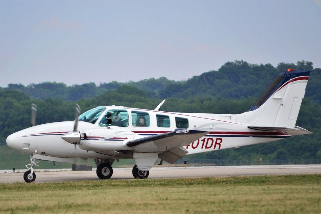 Beechcraft Baron (58) (N40DR) - Baron N401DR and a lucky kid taxi to parking after landing at KLUK.